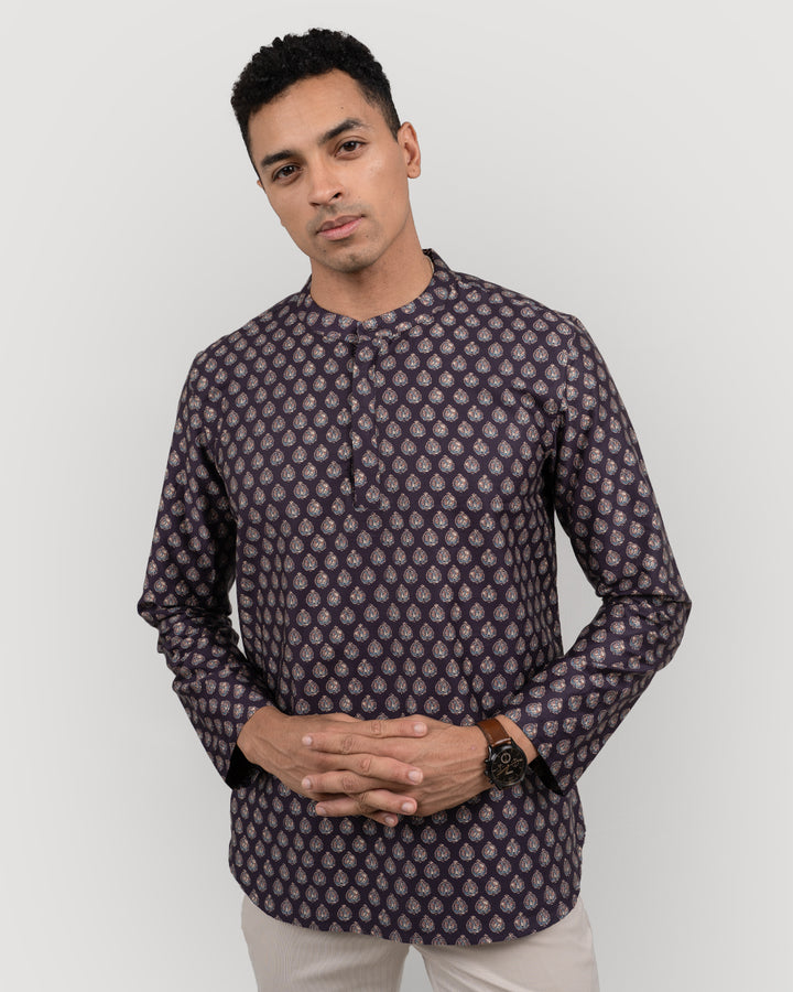 Comfortable traditional short kurta for men, ideal for casual and festive wear.