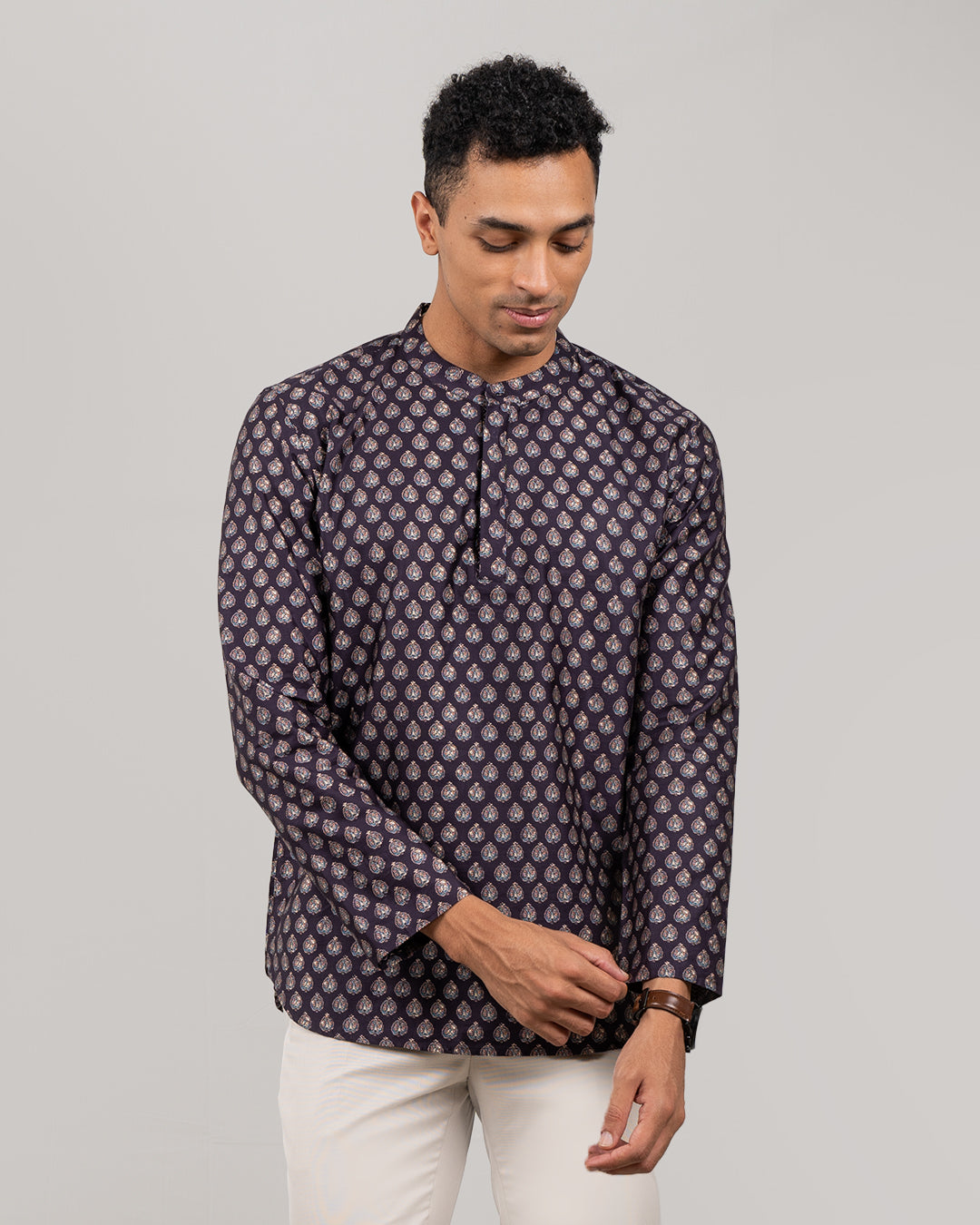 Comfortable traditional short kurta for men, ideal for casual and festive wear.